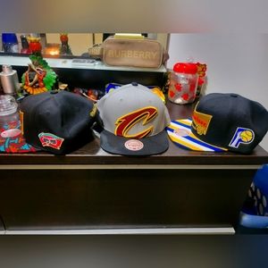 One size fit all Mitchell and Ness snapback hats practically new only worn twice